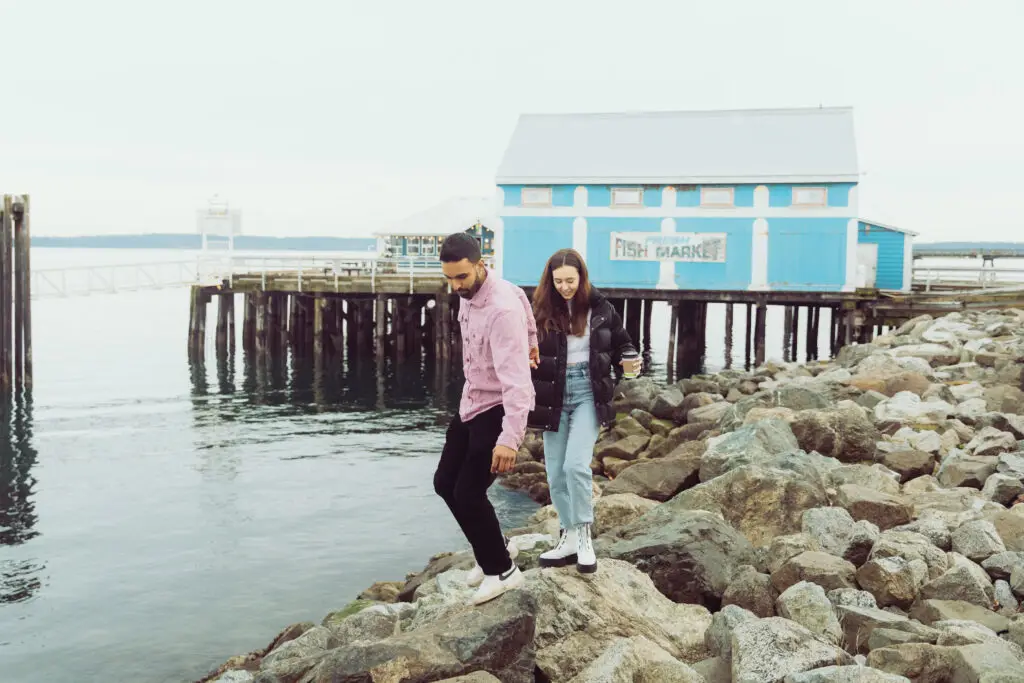 Couple exploring Sidney's waterfront near the fish market